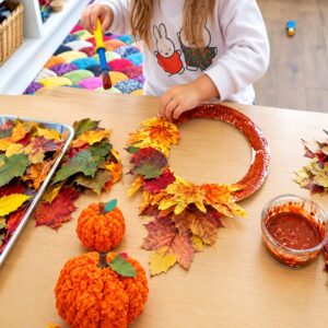 Children taking part in creative activities at nursery