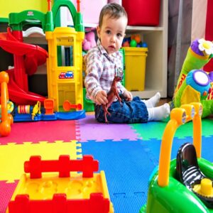 Children enjoying outdoor activities at Fulham nursery